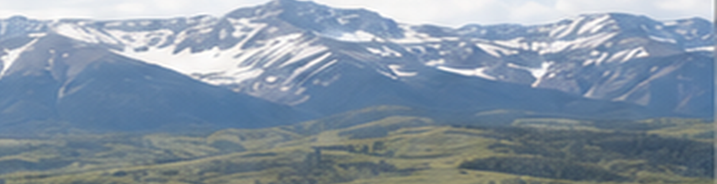 Rolling Alberta farmland and foothills that surround the province's rural communities.
